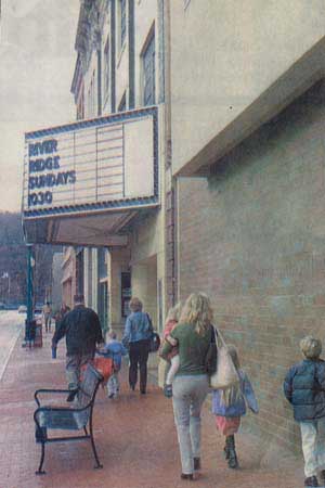 Guess what caught Bill's eye in this pic of folks on their way to church.