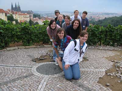 Rachel and her friends pass the time in Prague by assembling a large jigsaw puzzle.