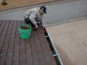 rain gutter cleaning scoop clean flush out repair maintenance screening leaf guard grating