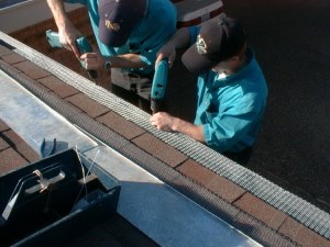 rain gutter screening grating protecting covering leaf guard preservation maintenance rust prevention