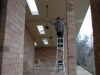 Tim wipes down outdoor patio ceiling fans top to bottom before cleaning windows.