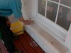 Shaun makes sure the entire window perimeter including this stone sill will be looking as good as the window when he's through.