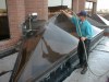After prewashing and thoroughly scrubbing the surface, Shaun gives these skylights another rinsing.