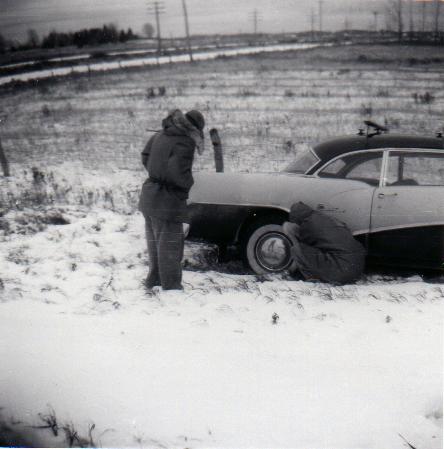 Jim and Jan getting Car out of the Snow