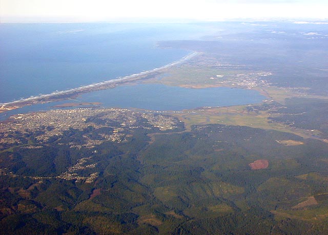 [Oblique aerial photo looking north at Eureka, Humboldt Bay and Arcata]