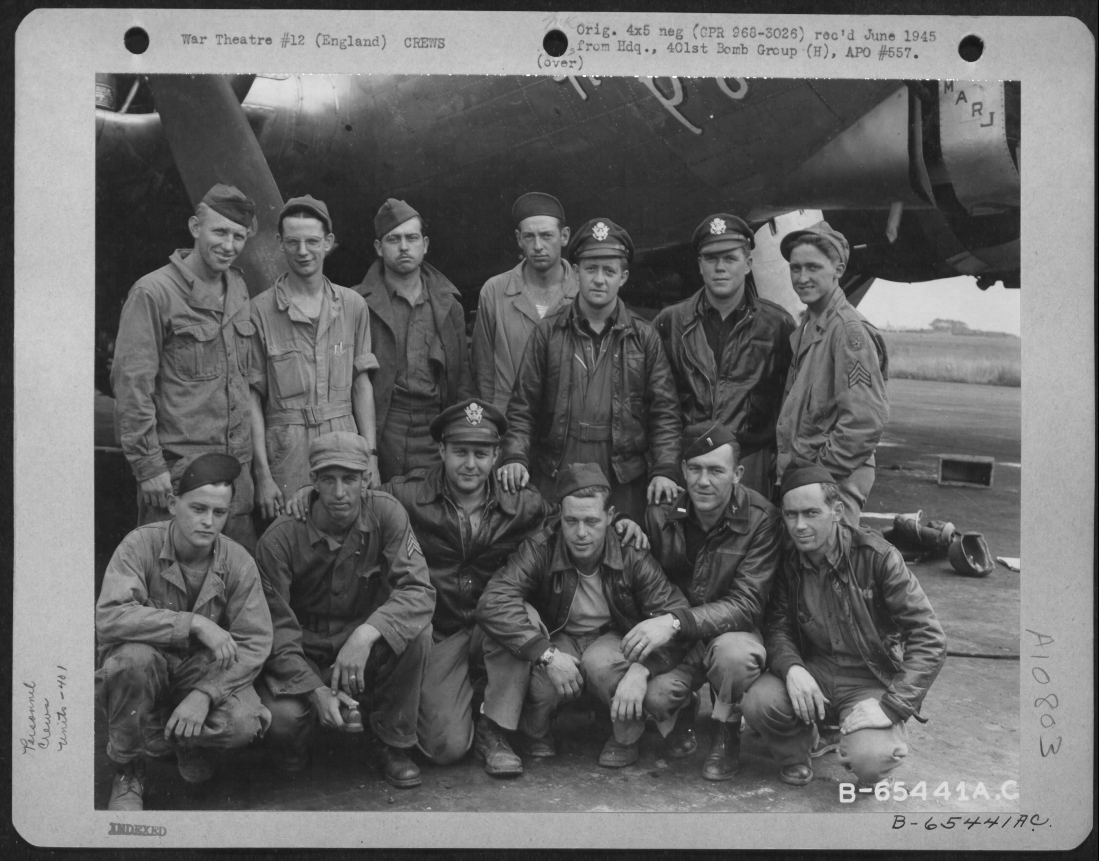 image of C.G. Lemmons and crew next to aircraft Homing Pigeon