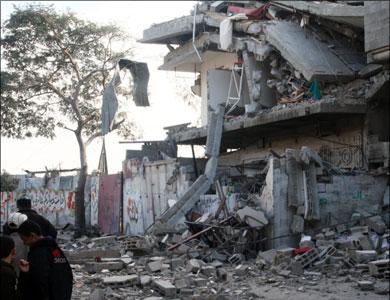 img_352eb792da_gaza_home_sandwitched_aljazeera